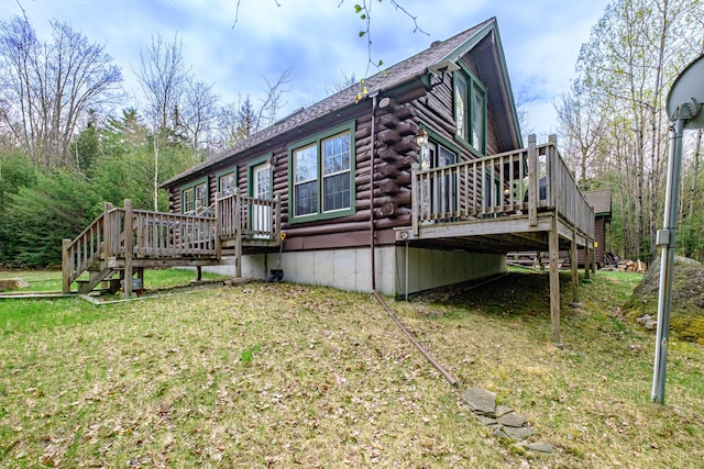 26 Mountain View Ln, Woodstock, ME 04219 - view of side of property featuring a yard, log siding, a deck, and stairs