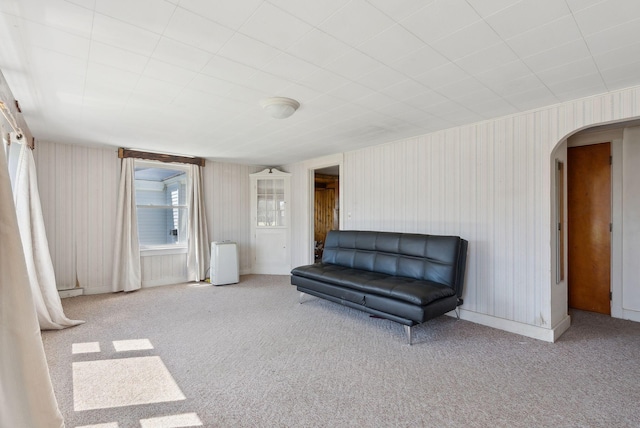 232 Peltoma Ave, Pittsfield, ME 04967 - sitting room featuring arched walkways and carpet flooring
