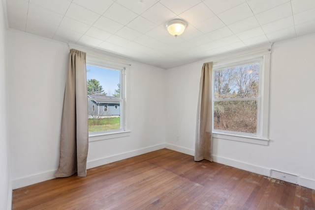 232 Peltoma Ave, Pittsfield, ME 04967 - spare room featuring hardwood / wood-style flooring and baseboards
