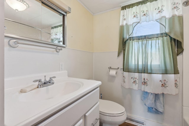 232 Peltoma Ave, Pittsfield, ME 04967 - bathroom with vanity, toilet, and ornamental molding