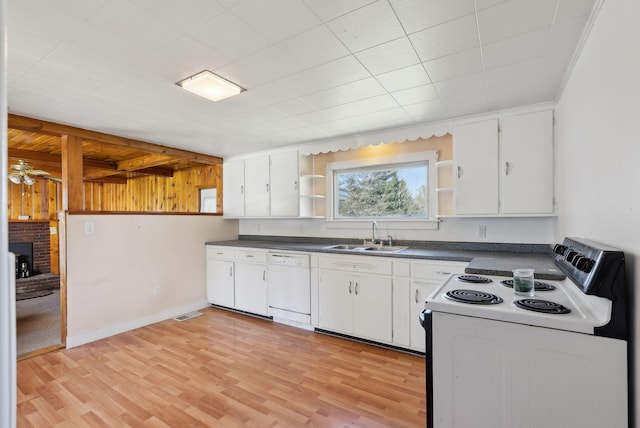 232 Peltoma Ave, Pittsfield, ME 04967 - kitchen featuring white appliances, open shelves, a sink, dark countertops, and white cabinetry