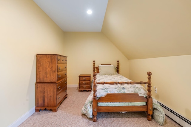 bedroom featuring a baseboard heating unit, baseboards, light colored carpet, and vaulted ceiling