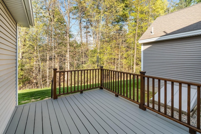 deck featuring a lawn
