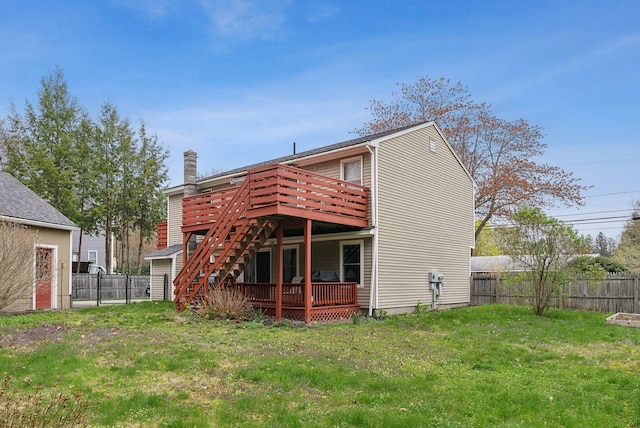 178 Bradley St, Saco, ME 04072 - rear view of house with a wooden deck, stairway, and a chimney