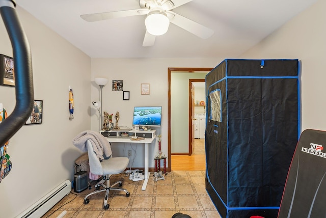 178 Bradley St, Saco, ME 04072 - office space with a baseboard heating unit, a ceiling fan, tile patterned floors, and washer / clothes dryer