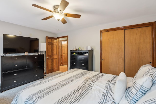 178 Bradley St, Saco, ME 04072 - bedroom featuring a closet, light colored carpet, and a ceiling fan