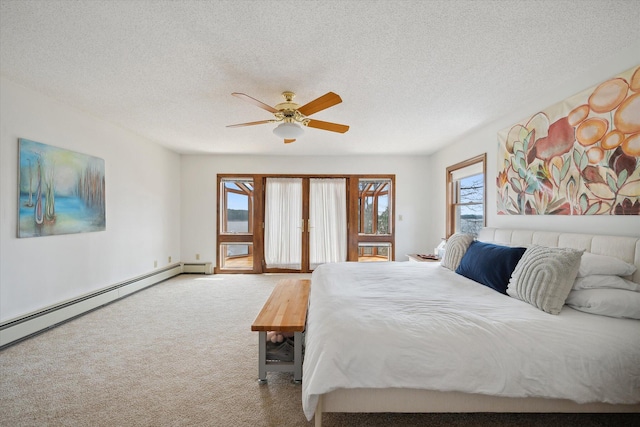 bedroom featuring access to outside, carpet, a baseboard heating unit, a textured ceiling, and a ceiling fan