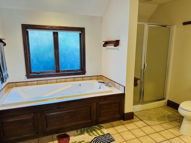 full bath with tile patterned flooring, a shower stall, a bath, toilet, and lofted ceiling