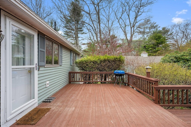 deck featuring a grill