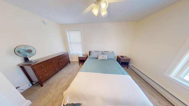 bedroom featuring baseboards, a baseboard radiator, ceiling fan, and light carpet