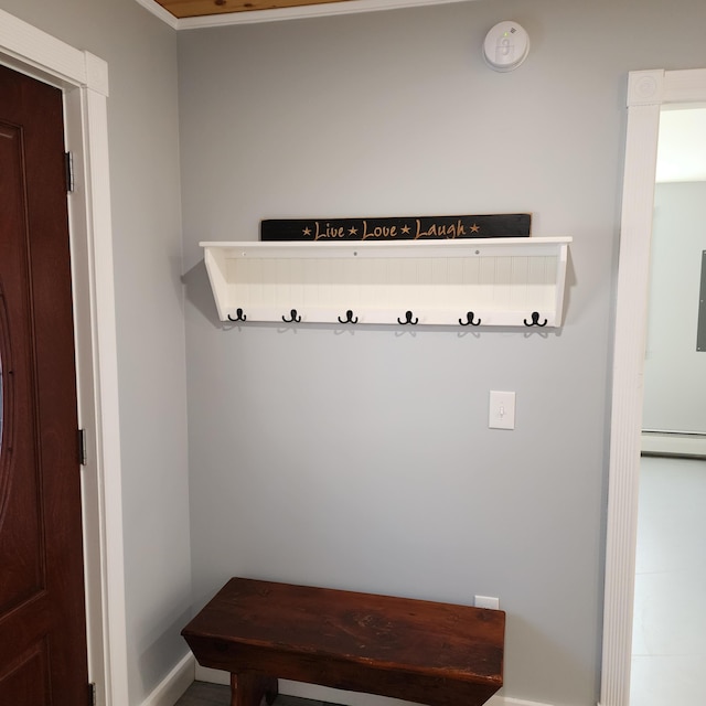 mudroom featuring baseboards and a baseboard heating unit