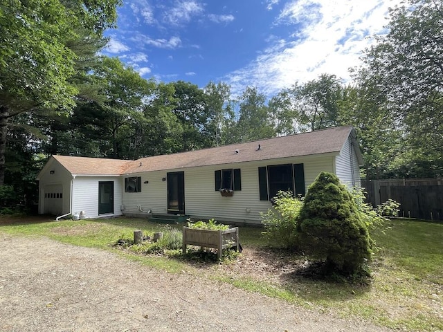 45 Seaview Ter, Belfast, ME 04915 - view of front facade with a garage, driveway, and view of scattered trees