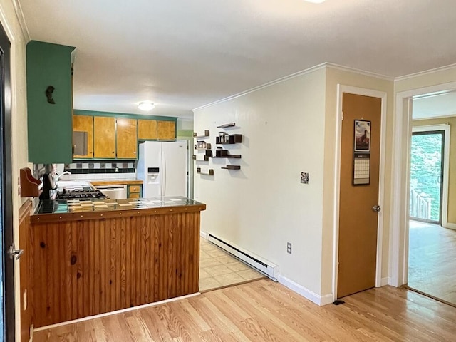 45 Seaview Ter, Belfast, ME 04915 - kitchen with white fridge with ice dispenser, baseboard heating, tile countertops, stainless steel dishwasher, and a peninsula