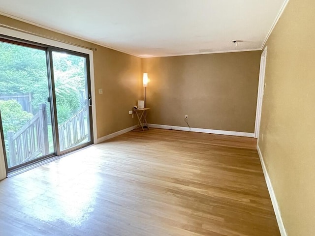 45 Seaview Ter, Belfast, ME 04915 - empty room with ornamental molding and wood finished floors