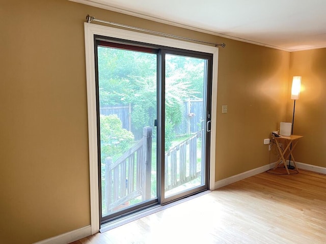 45 Seaview Ter, Belfast, ME 04915 - entryway with light wood-type flooring and crown molding