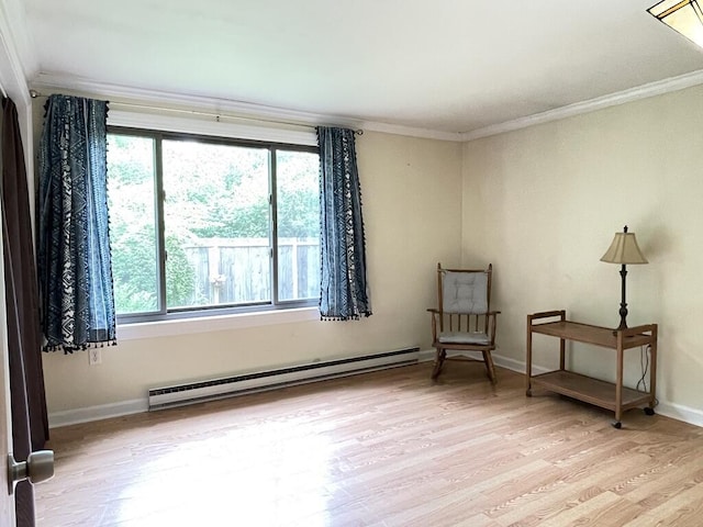 45 Seaview Ter, Belfast, ME 04915 - unfurnished room featuring a baseboard heating unit, ornamental molding, plenty of natural light, and light wood-style floors