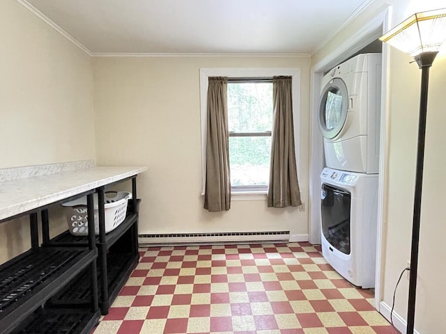 45 Seaview Ter, Belfast, ME 04915 - laundry area with stacked washer / drying machine, a baseboard heating unit, ornamental molding, and light flooring