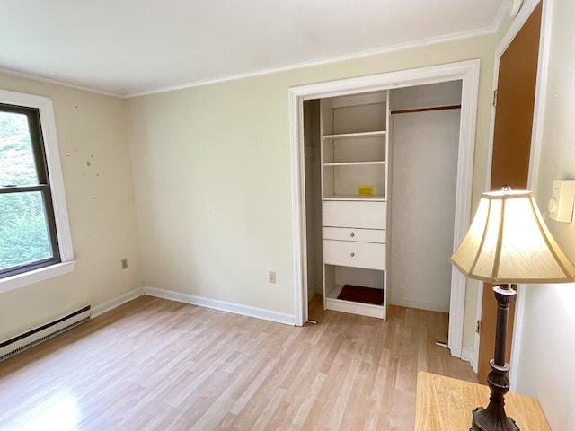 45 Seaview Ter, Belfast, ME 04915 - unfurnished bedroom with light wood-style floors, a baseboard heating unit, and ornamental molding