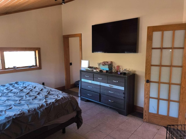 29 Punkin Hill Rd, South Thomaston, ME 04858 - bedroom with wooden ceiling, light tile patterned floors, and baseboards