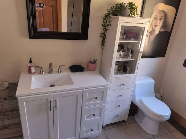 29 Punkin Hill Rd, South Thomaston, ME 04858 - bathroom with tile patterned flooring, toilet, and vanity