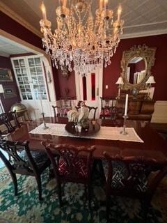 17 Boynton St, Eastport, ME 04631 - dining space featuring crown molding and a chandelier