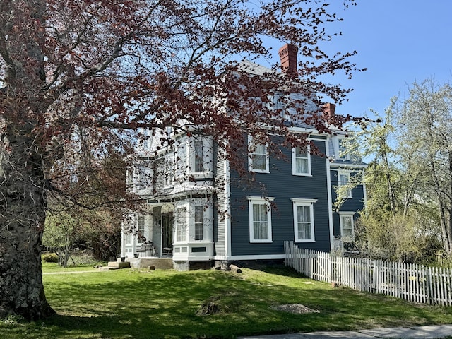 17 Boynton St, Eastport, ME 04631 - view of property exterior featuring a chimney