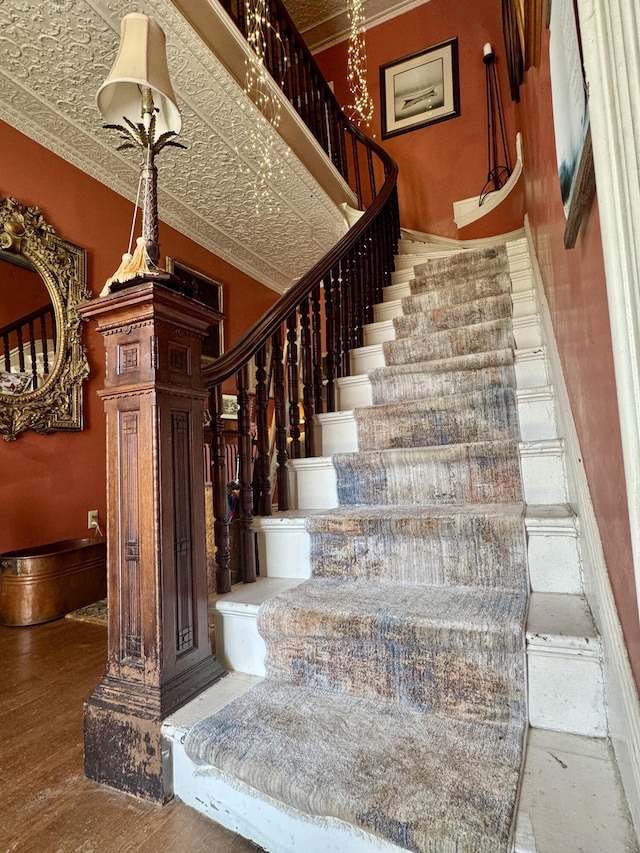 17 Boynton St, Eastport, ME 04631 - stairway featuring decorative columns and ornamental molding