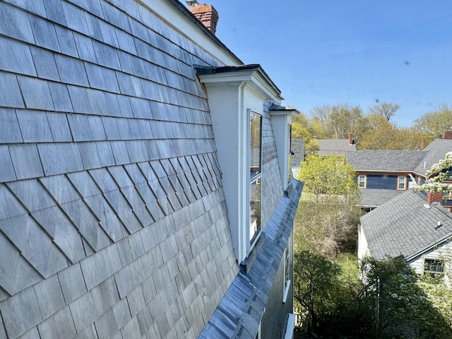 17 Boynton St, Eastport, ME 04631 - view of property exterior featuring a chimney