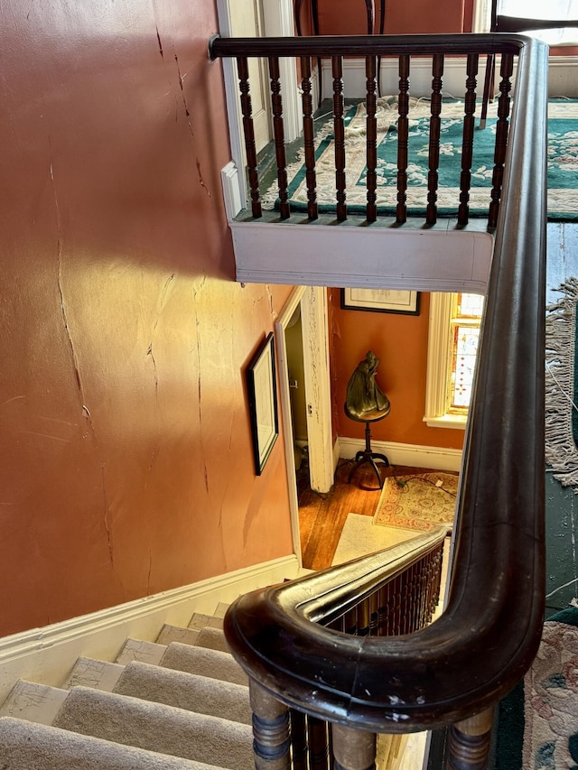 17 Boynton St, Eastport, ME 04631 - stairs featuring baseboards and wood finished floors
