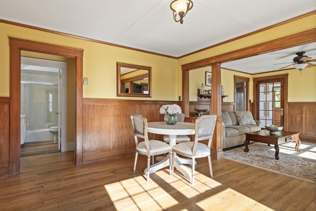 47 Atlantic Ave, Boothbay Harbor, ME 04538 - dining space featuring a wainscoted wall and wood finished floors