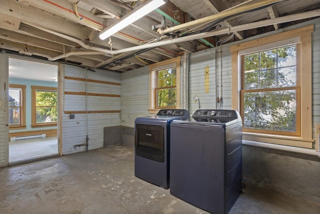 47 Atlantic Ave, Boothbay Harbor, ME 04538 - clothes washing area featuring laundry area, independent washer and dryer, a baseboard heating unit, and a healthy amount of sunlight