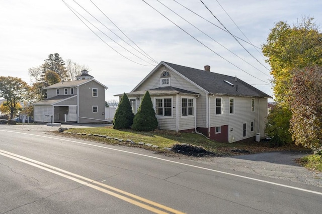 47 Atlantic Ave, Boothbay Harbor, ME 04538 - view of front of home with a chimney