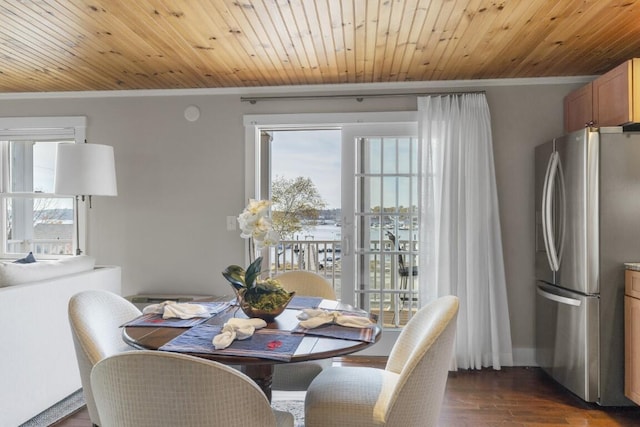 47 Atlantic Ave, Boothbay Harbor, ME 04538 - dining space featuring crown molding and dark wood-type flooring