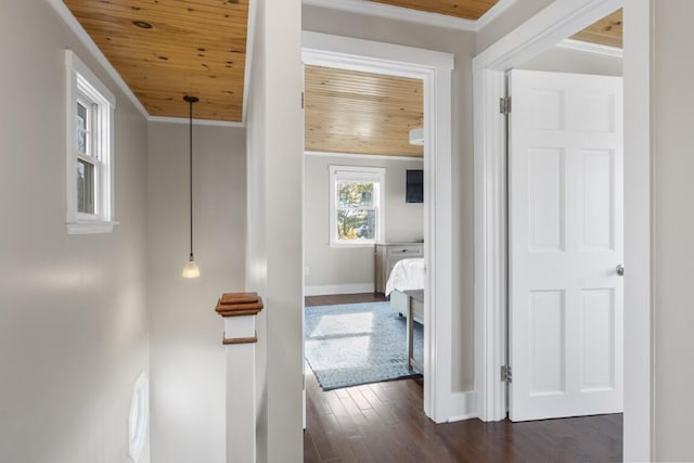 47 Atlantic Ave, Boothbay Harbor, ME 04538 - hall featuring crown molding, baseboards, dark wood-style floors, and wood ceiling