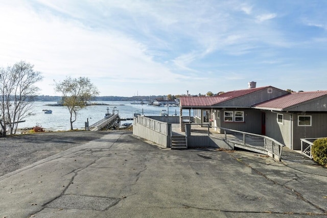 47 Atlantic Ave, Boothbay Harbor, ME 04538 - view of patio / terrace with a deck with water view
