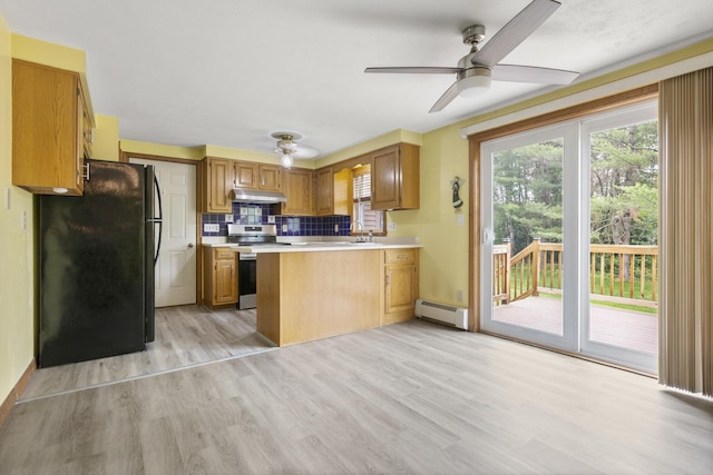 84 Old Carriage Rd Unit 84, Auburn, ME 04210 - kitchen with freestanding refrigerator, stainless steel electric range, under cabinet range hood, a ceiling fan, and a baseboard heating unit