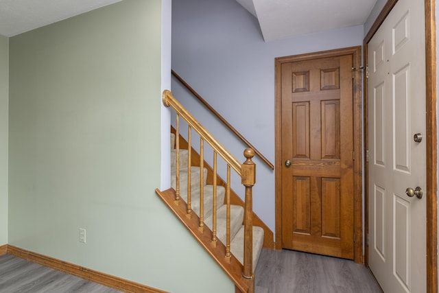 84 Old Carriage Rd Unit 84, Auburn, ME 04210 - stairs featuring wood finished floors and baseboards