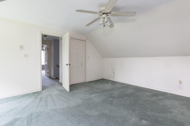 84 Old Carriage Rd Unit 84, Auburn, ME 04210 - additional living space with carpet flooring, ceiling fan, and vaulted ceiling