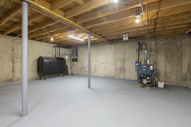84 Old Carriage Rd Unit 84, Auburn, ME 04210 - unfinished below grade area featuring heating fuel, electric panel, and a heating unit