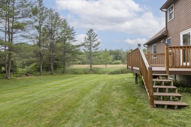 84 Old Carriage Rd Unit 84, Auburn, ME 04210 - view of grassy yard with a deck and stairway