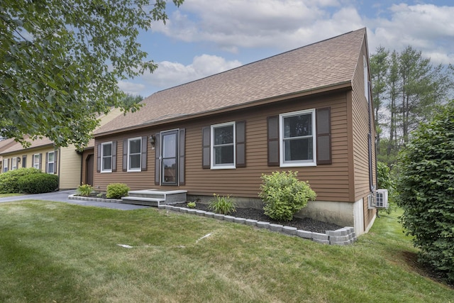 84 Old Carriage Rd Unit 84, Auburn, ME 04210 - view of front of home featuring roof with shingles and a front yard