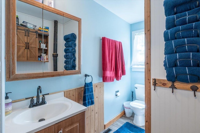 433 N Union Rd, Union, ME 04862 - bathroom featuring vanity, toilet, and wood finished floors