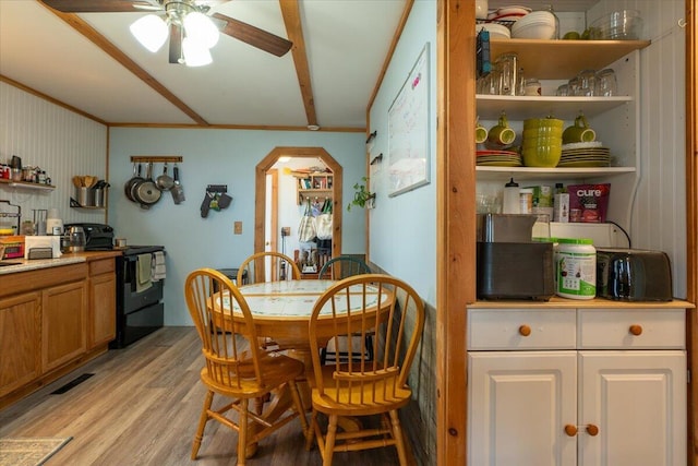 433 N Union Rd, Union, ME 04862 - dining room with arched walkways, ceiling fan, and light wood-style flooring
