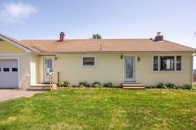 433 N Union Rd, Union, ME 04862 - single story home featuring a garage, a chimney, a shingled roof, and a front yard