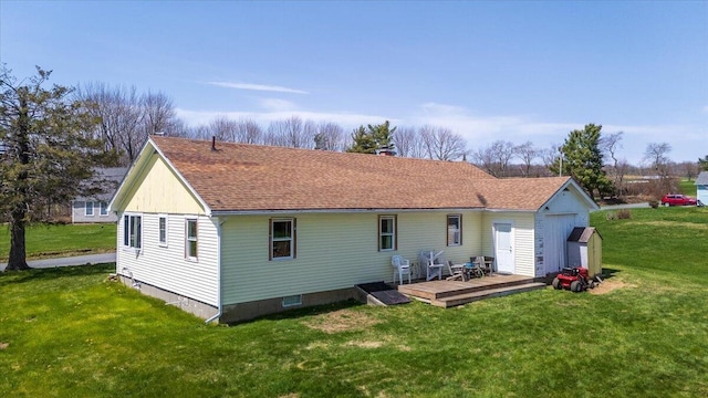 433 N Union Rd, Union, ME 04862 - rear view of house featuring a lawn, a wooden deck, and roof with shingles