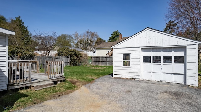 867 Minot Ave, Auburn, ME 04210 - detached garage featuring asphalt driveway