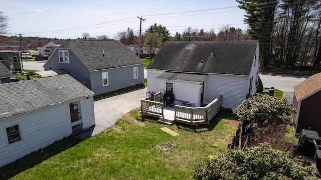 867 Minot Ave, Auburn, ME 04210 - rear view of house with a deck, a yard, and driveway