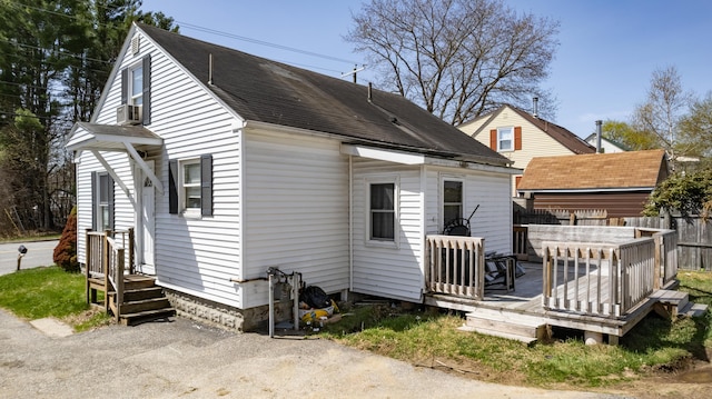867 Minot Ave, Auburn, ME 04210 - back of house featuring a wooden deck, roof with shingles, and cooling unit