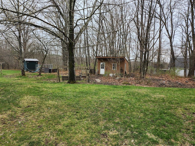 53 Village Rd, Stetson, ME 04488 - view of grassy yard featuring an outdoor structure