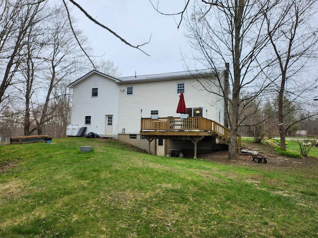 53 Village Rd, Stetson, ME 04488 - back of house featuring a deck and a yard